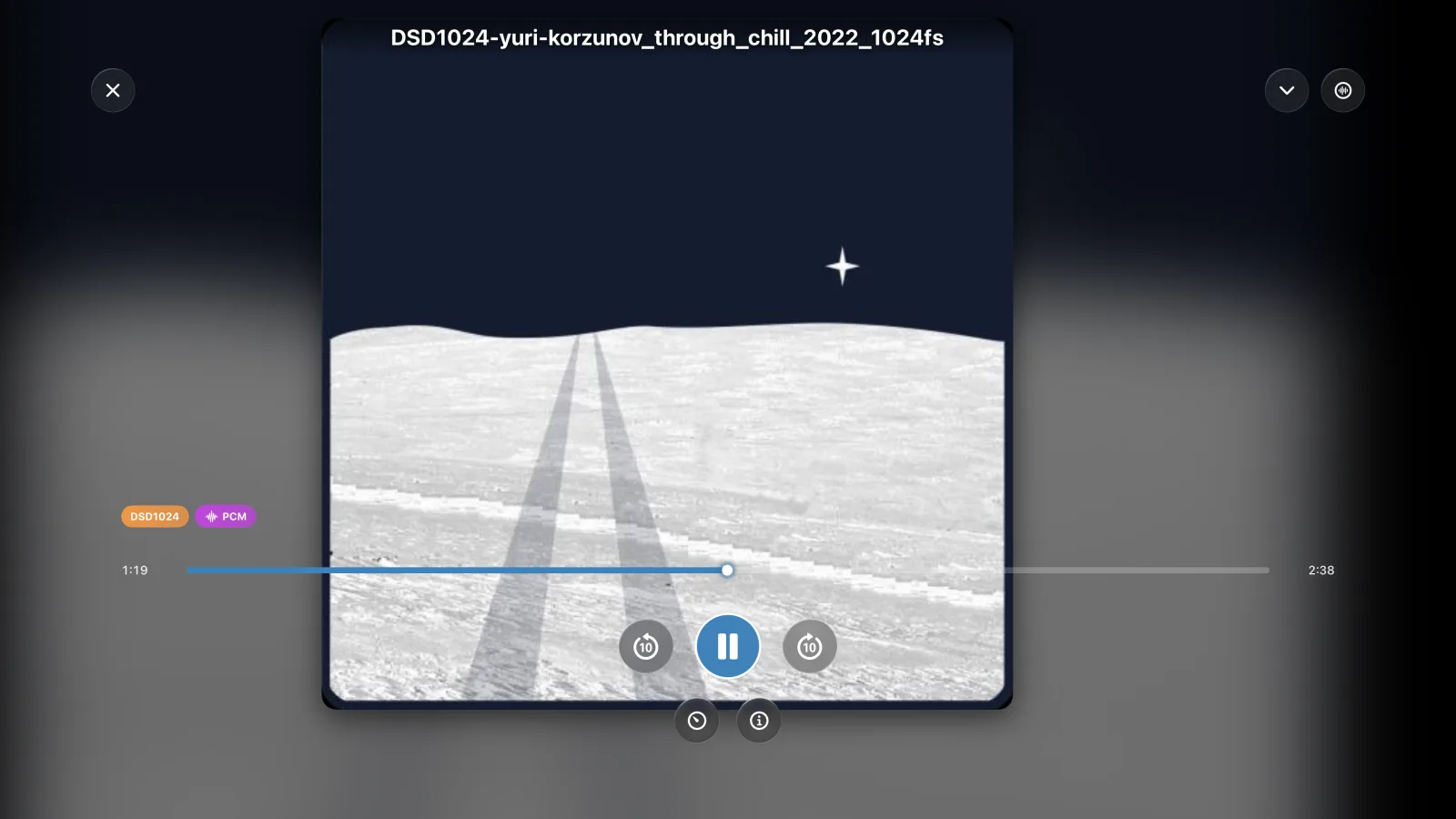 Apple TV 上的全屏音频播放器正在播放一首 DSD1024 测试曲目，界面显示 DSD1024 与 PCM 角标。
